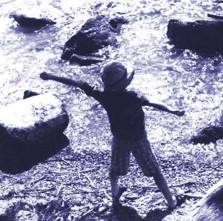 Junge am Meer